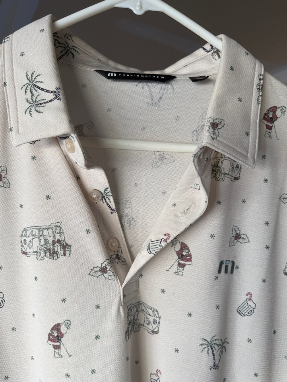 Travis Mathew Cream Polo with Holiday Mini Print
